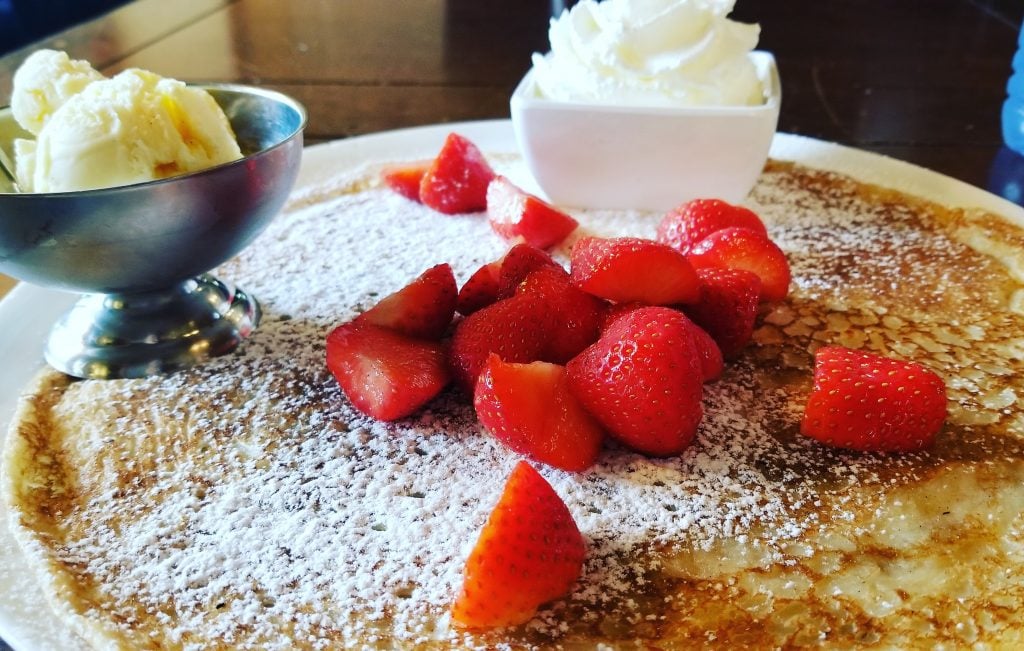 dutch pancake topped with strawberries
