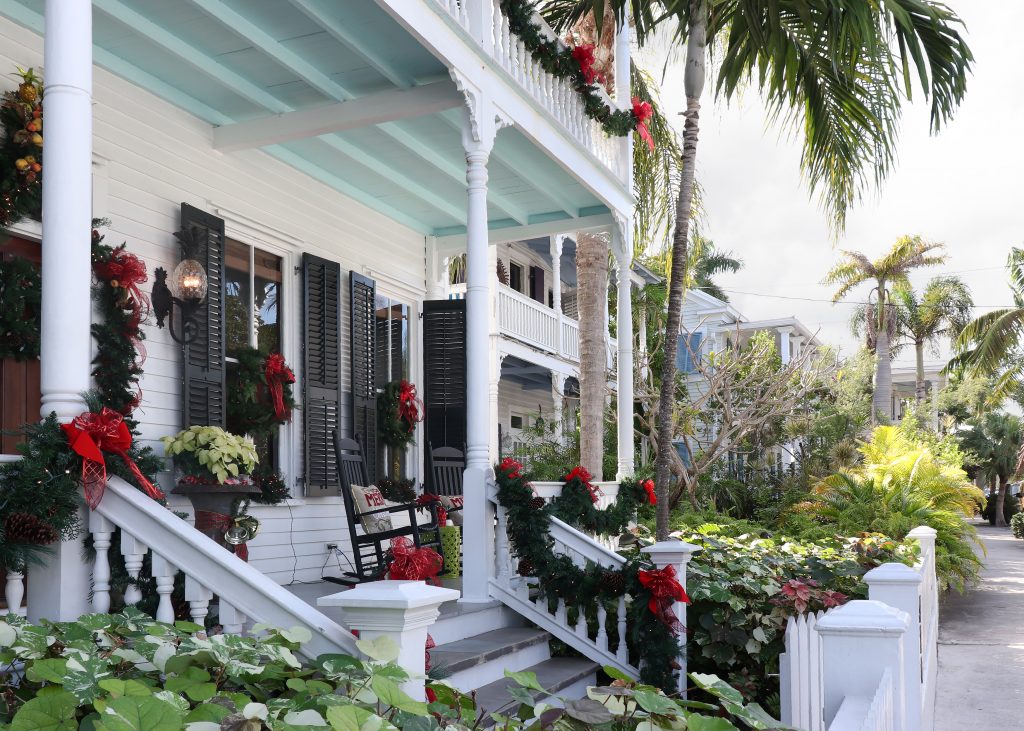 front facade of a house in key west florida decorated for christmas in usa