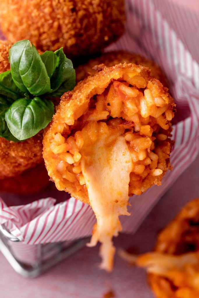 fried suppli in a basket, one of the best things to eat in rome italy