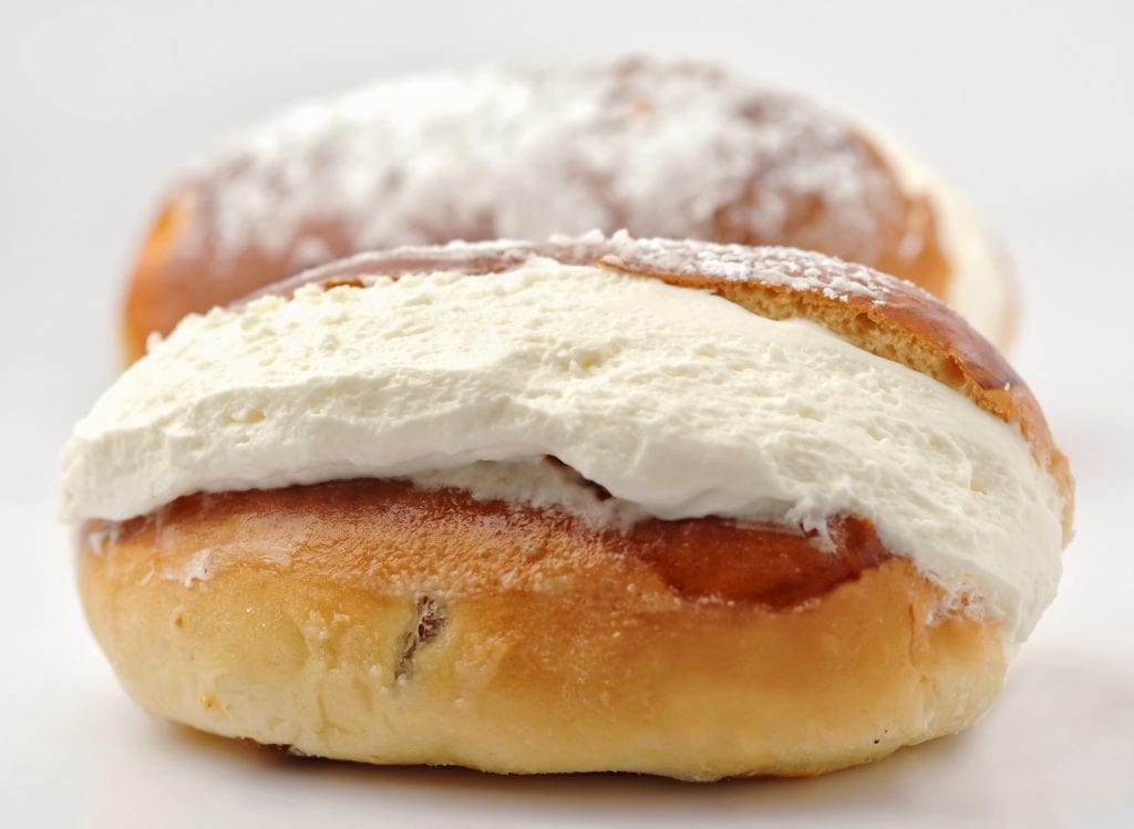 stuffed maritozzi buns against a white background, one of a traditional food in Rome Italy