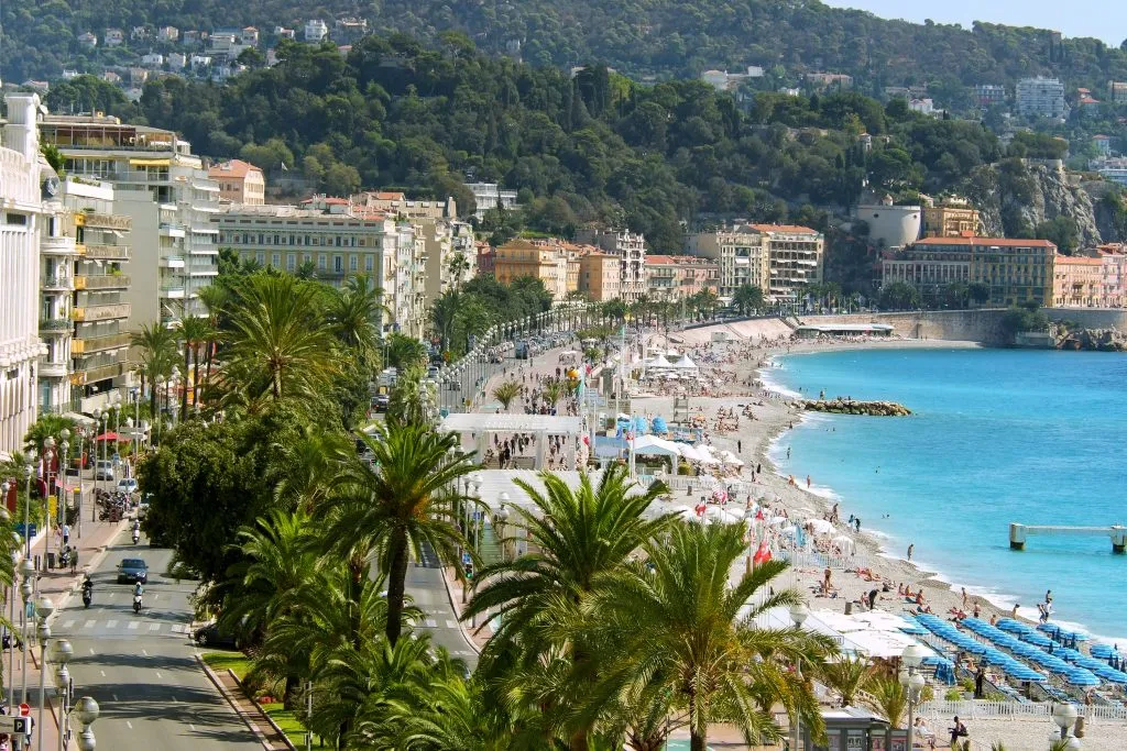 view of promenade des angalis from above in nice france with med to the right