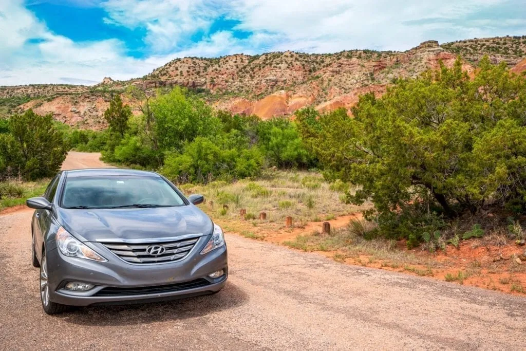 Gray Hyundai Sonata driving through Texas Palo Duro Canyon State Park