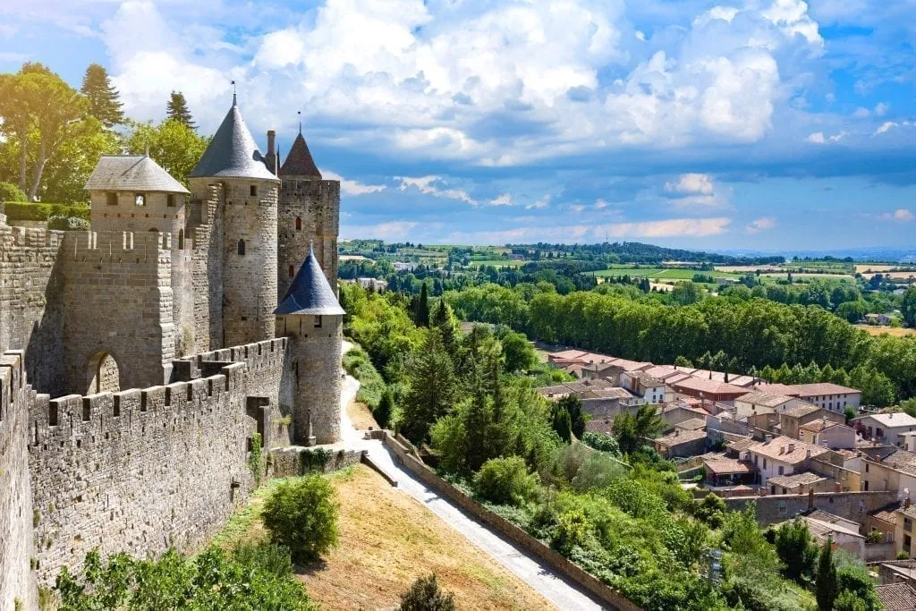 Carsaconne France, with the fortress visible on the left side of the photo and the village below it on the right