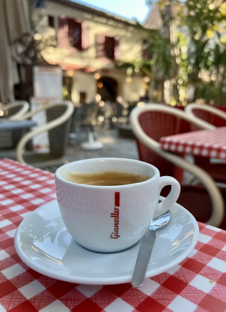 coffee on a red checkered table cloth in carcassonne france