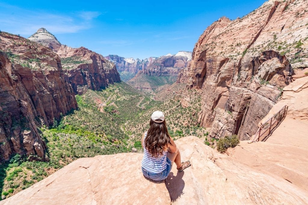 Kate Storm at the viewpoint at the Canyon Overlook Trail in Zion National Park Utah