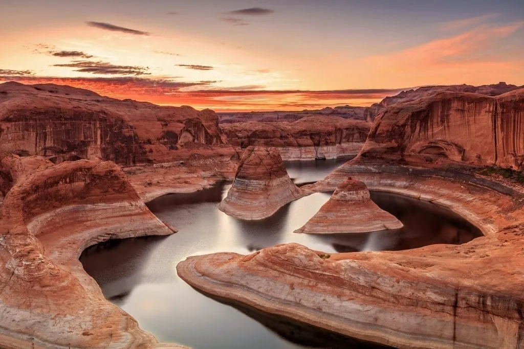 Lake Powell Utah at sunset with the lake curving in the distance
