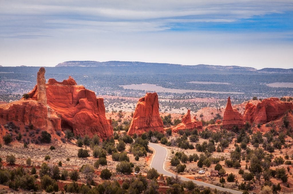 Kodachrome basin state park as seen from above with road winding through park, one of the best vacation spots in utah