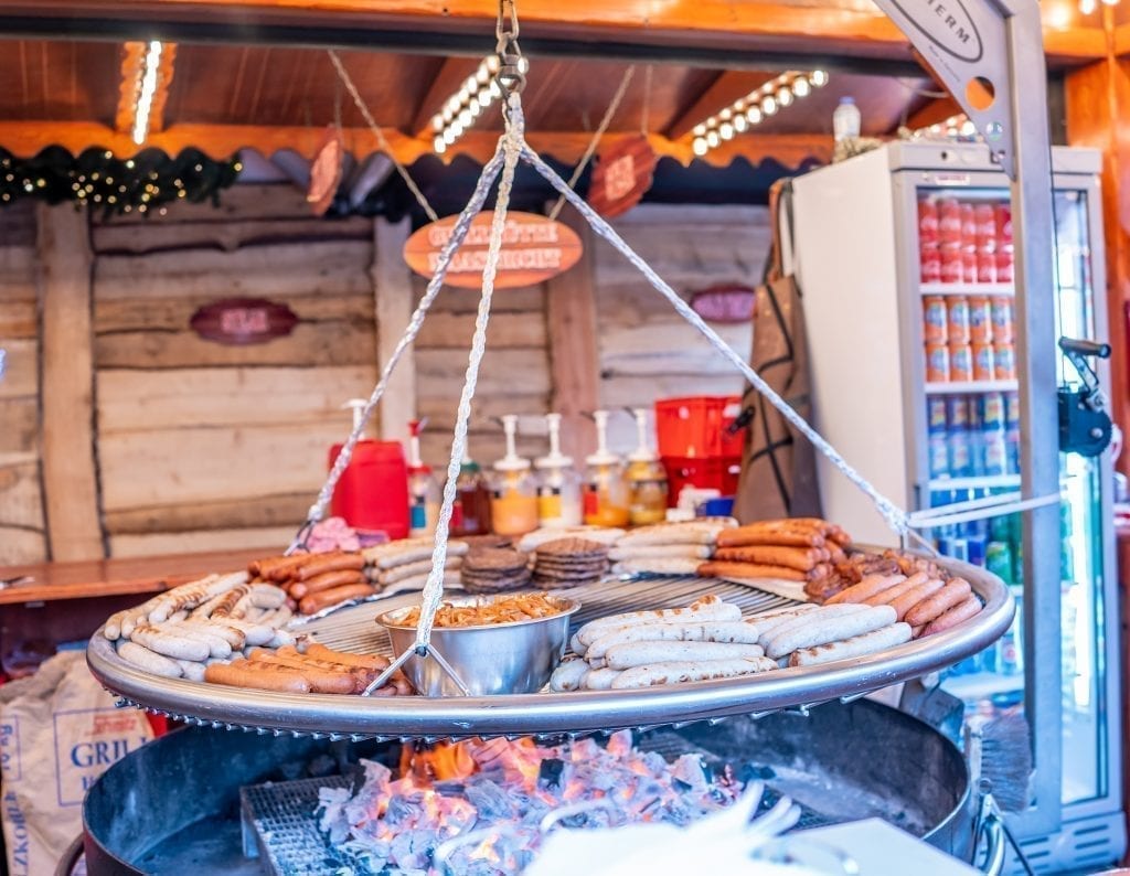 Sausages being grilled at a stall at a European Christmas market