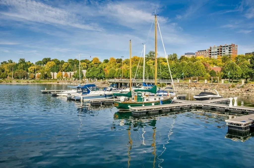 Sailboats parked on the edge of the lake in Burlington Vermont, one of the best weekend getaways from Boston