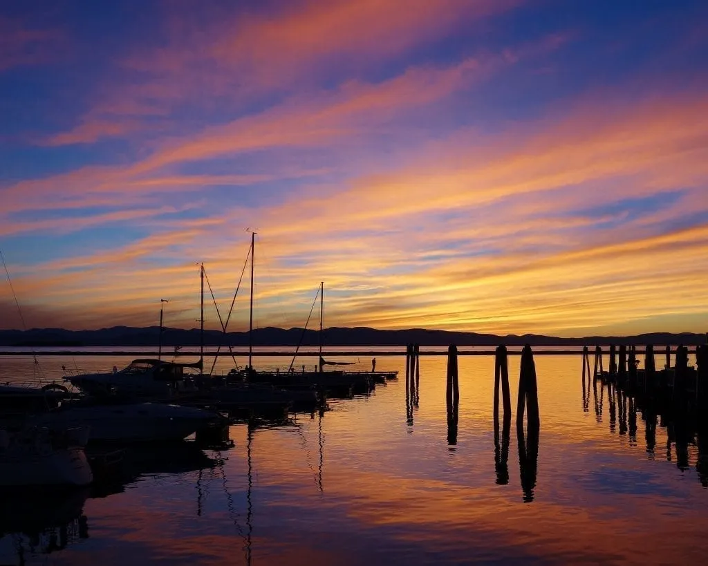 bright orange sunset over lake champlain