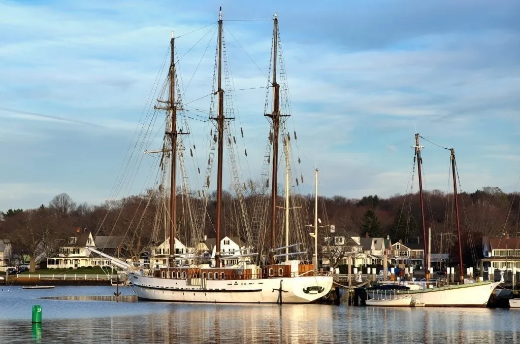 Historic tall ship in the harbor of Mystic Connecticut, one of the best weekend getaways from Boston ma