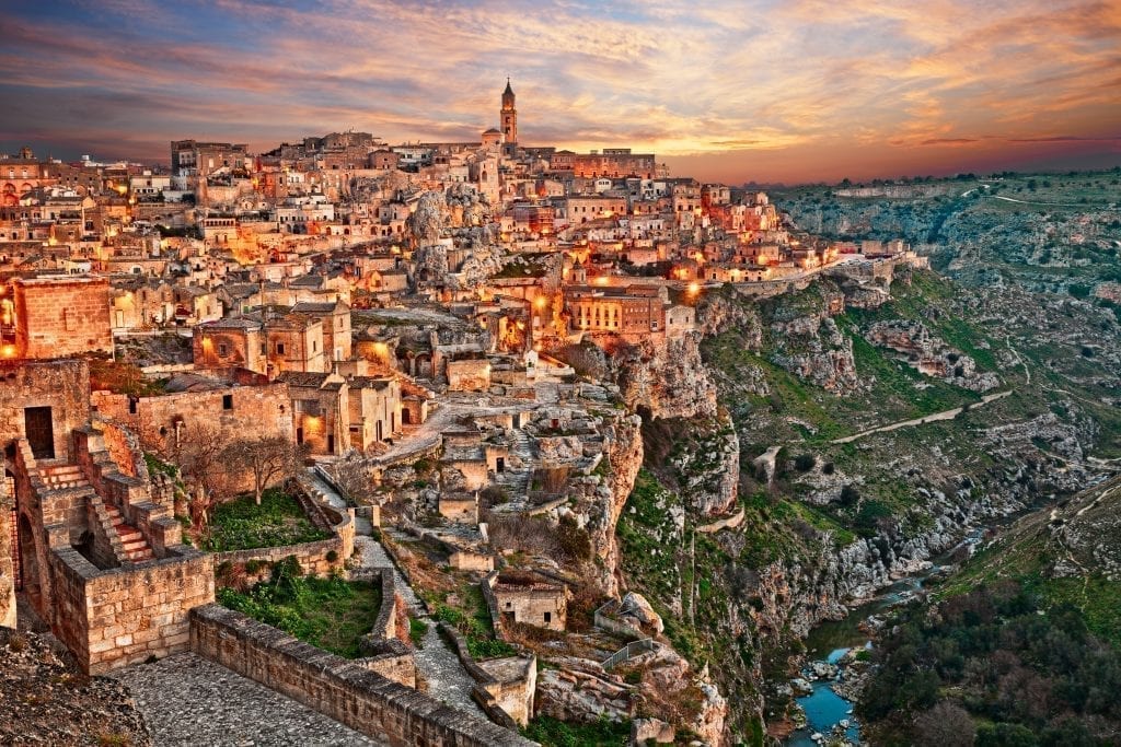 View of Matera at sunset from outside the city, one of the best Italy travel destinations