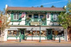 white and green shop in downtown estes park. shopping downtown is one of the best things to do in estes park colorado
