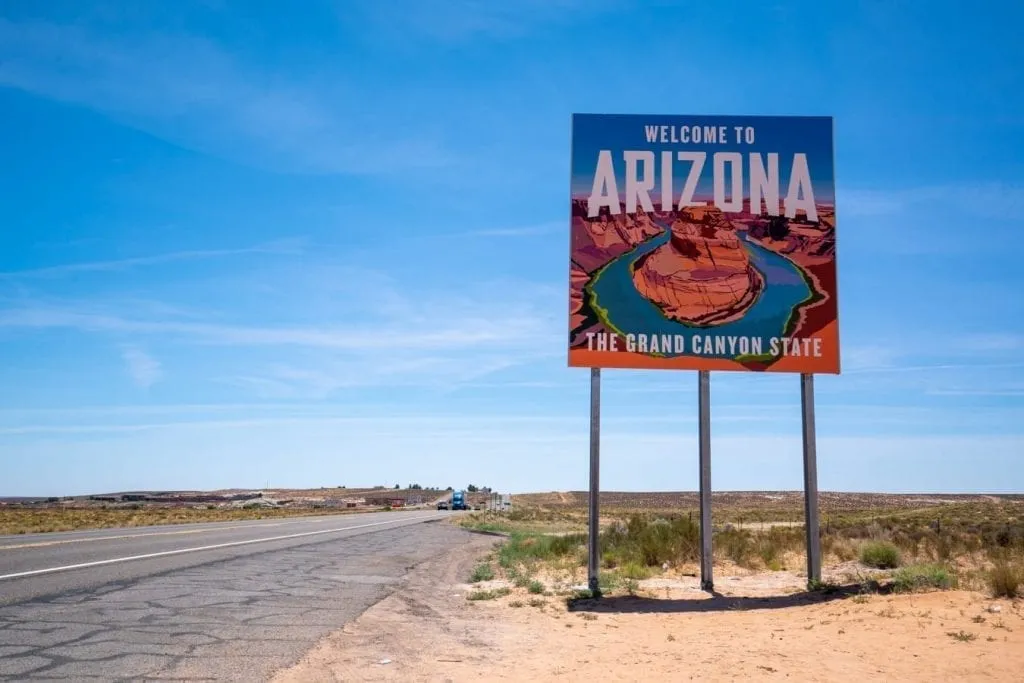 welcome to arizona sign as seen when driving into page az