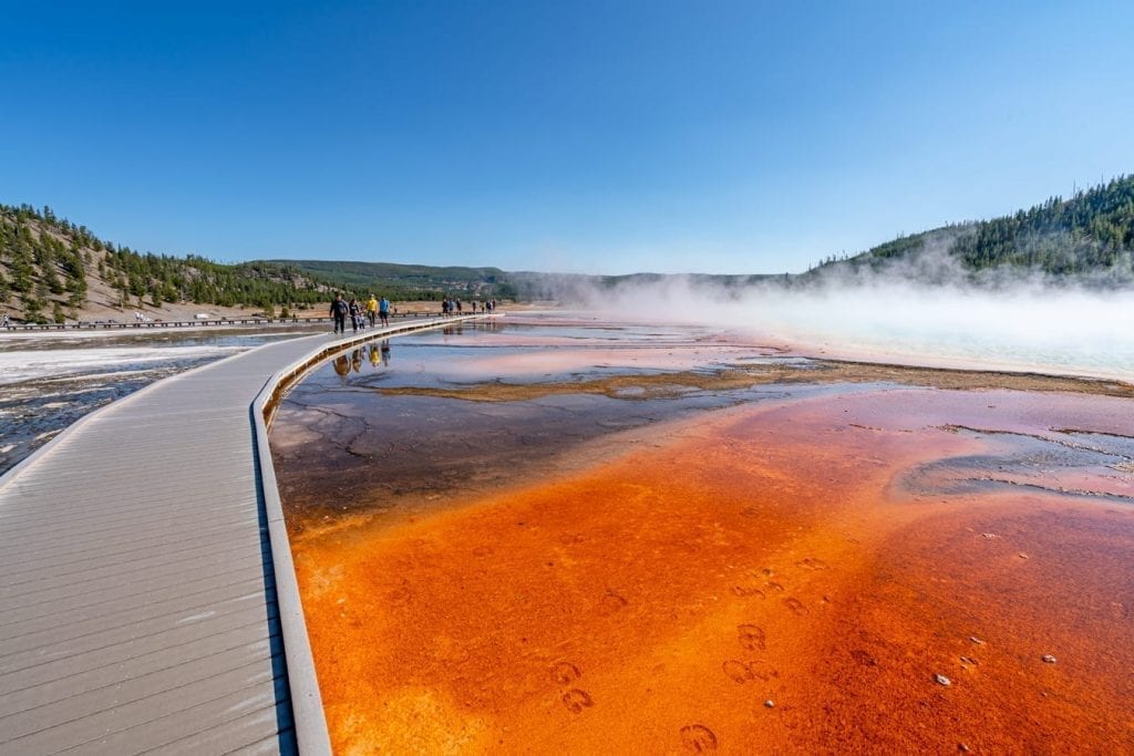boardwalk over great prismatic spring in yellowstone, one of the best national parks in usa
