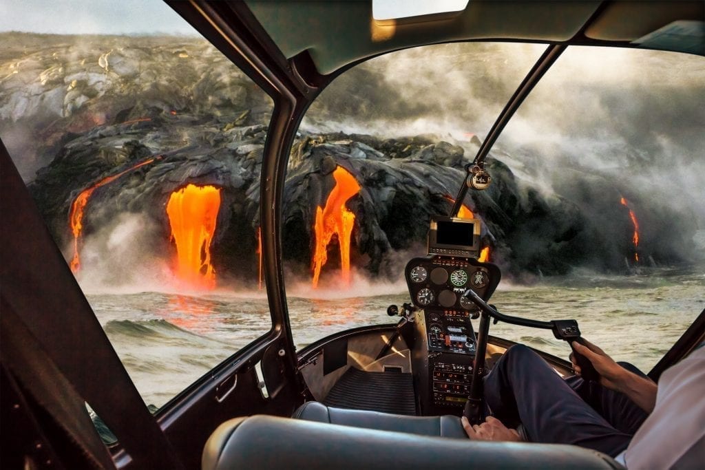 Lava flow at Hawaii's Volcanoes National Park as seen from inside a helicopter, one of the best usa national parks to see during winter