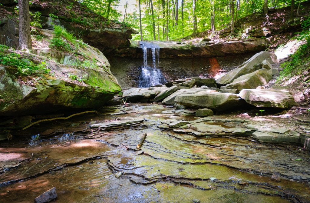 waterfall over a rocky ledge in cuyahoga valley ohio