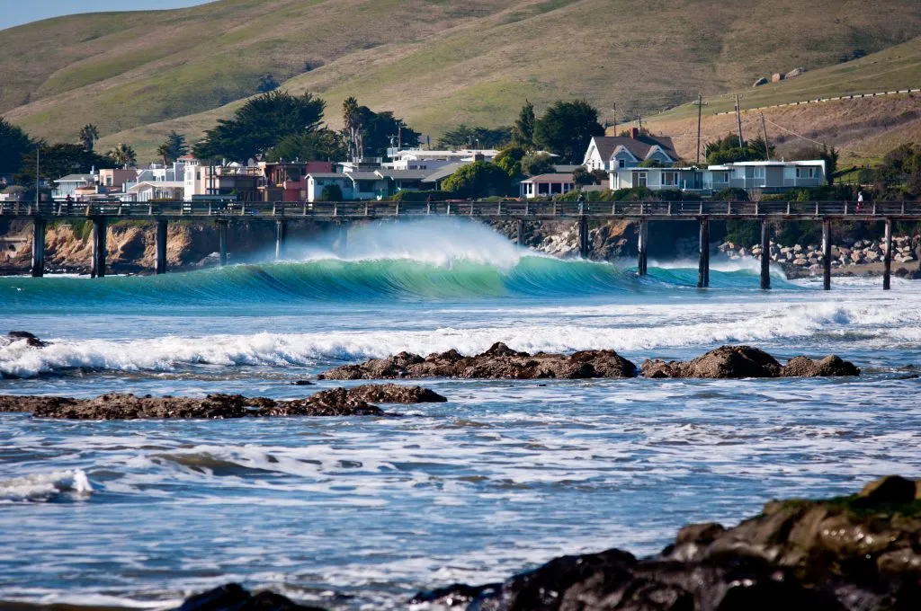 cayucos california as seen from across the water, one of the best small towns in usa