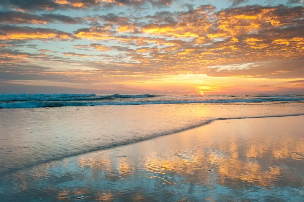 sunrise over outer banks beach. hatteras is one of the most beautiful small towns in america