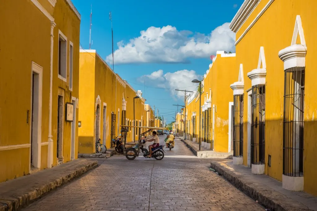 street lined with yellow buildings izamal mexico