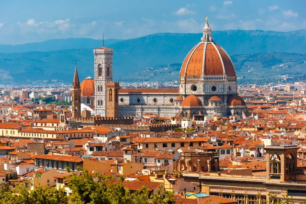 view of florence from above with duomo dominating the skyline, one of the fun things to do in europe