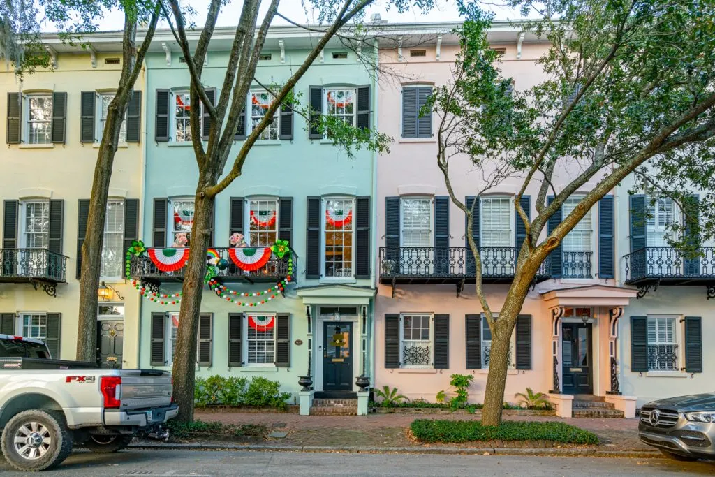 front facades of colorful houses on taylor street, one of the best savannah streets to visit