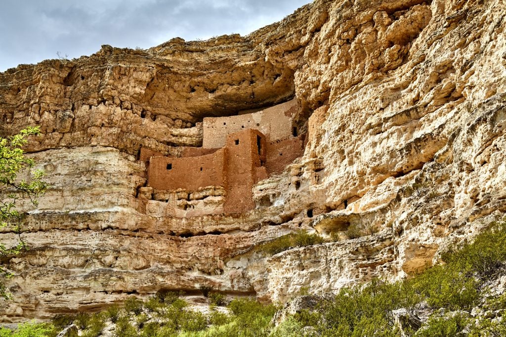 montezuma castle set into the rock wall, one of the best hidden gems in arizona to visit