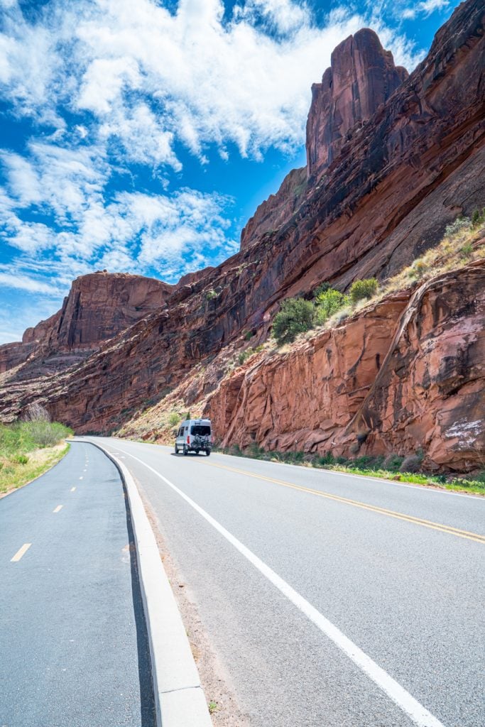 campervan driving along river road, one of the best things to do in moab utah