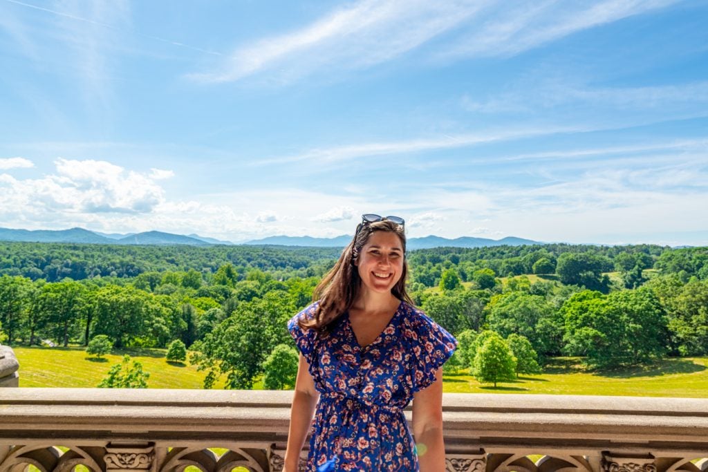 kate storm on loggia of biltmore house overlooking the countryside