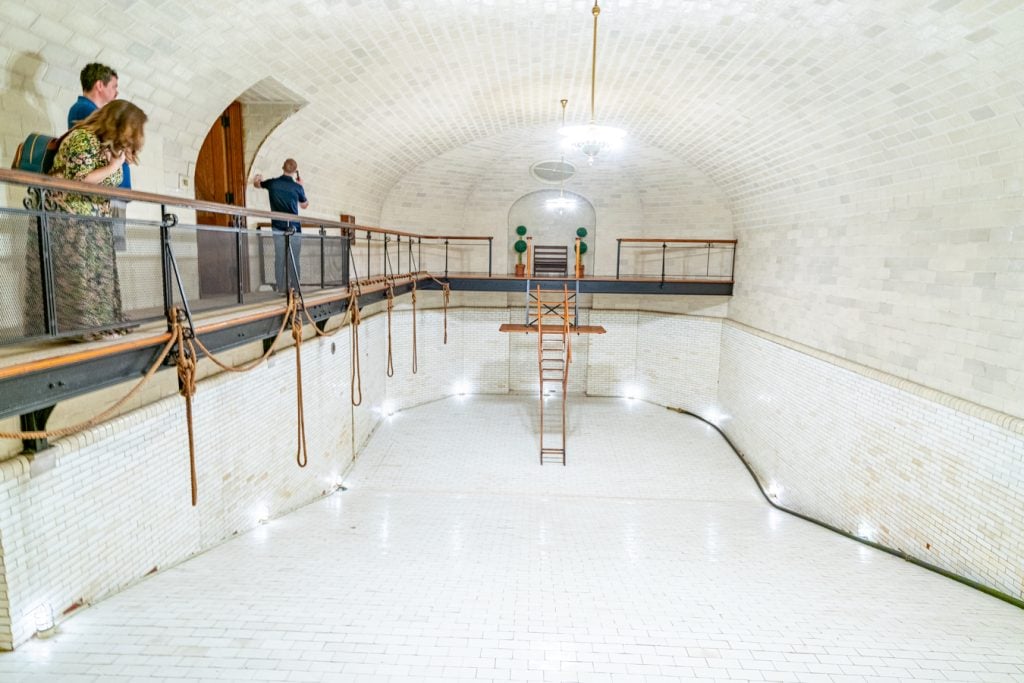 drained swimming pool inside basement biltmore house