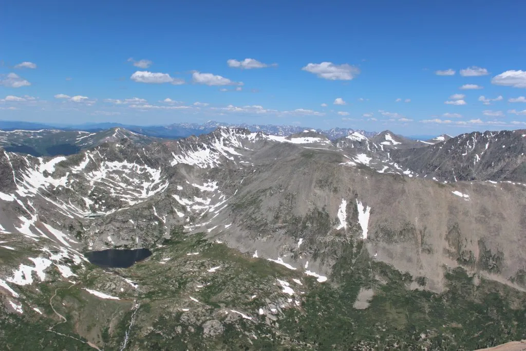 view of rocky mountains from summit of mount evans co