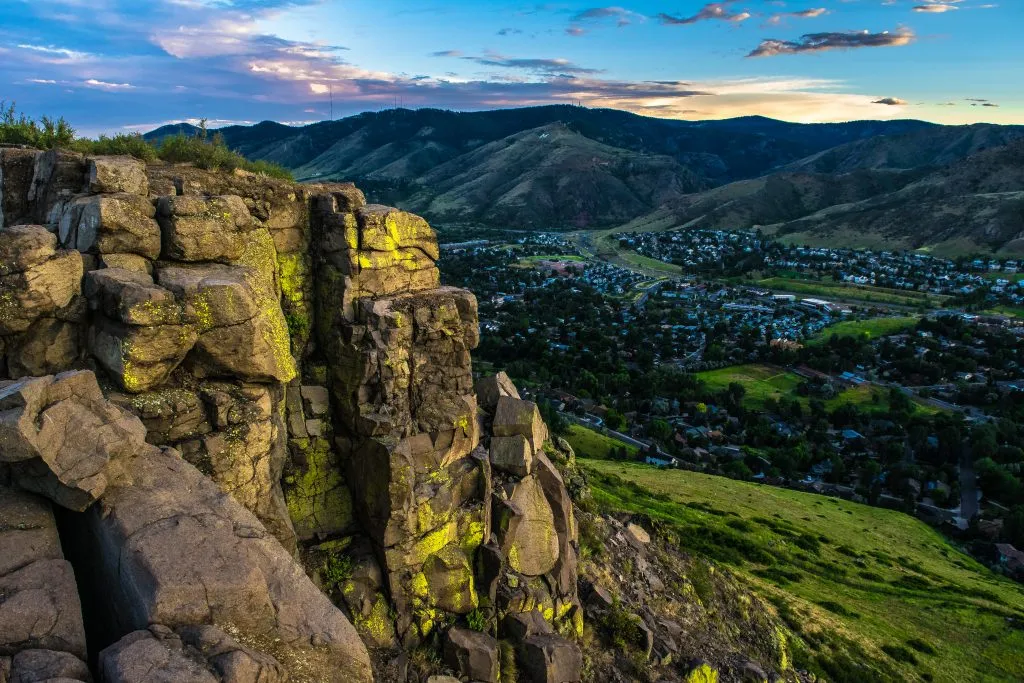 sunset over golden co as seen from a mountain ledge