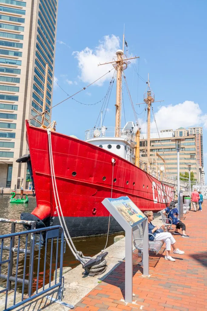 bright red historic ship in inner harbor, one of the best things to do in baltimore this weekend