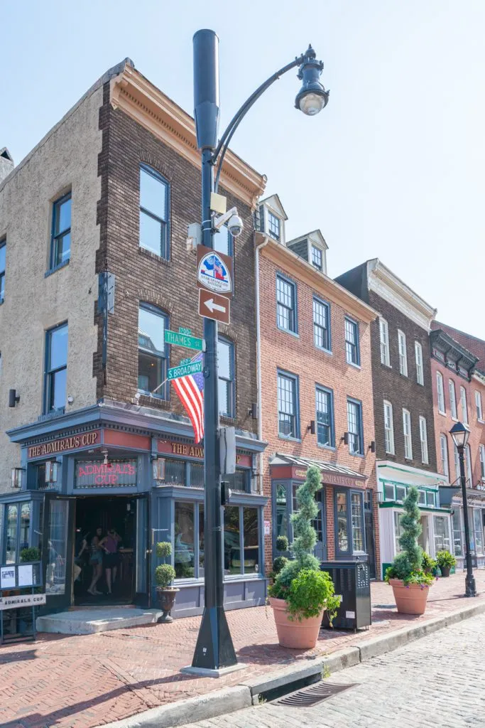 historic brick buildings on a cobblestone street in fells point