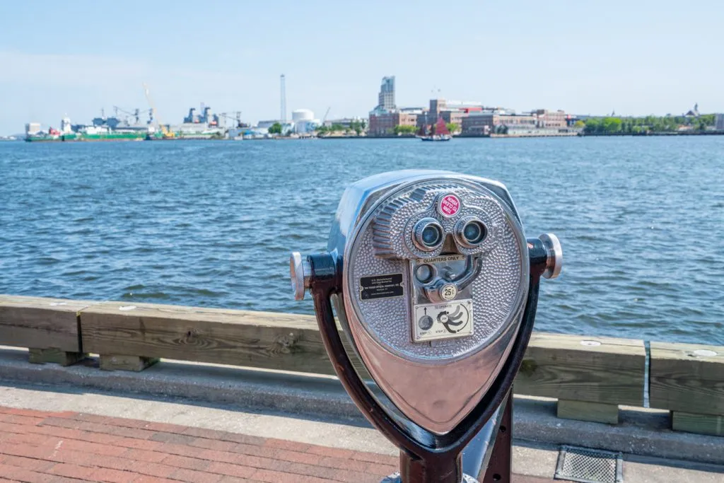 sightseeing binoculors on the edge of the water, as seen during a 3 day weekend in baltimore itinerary