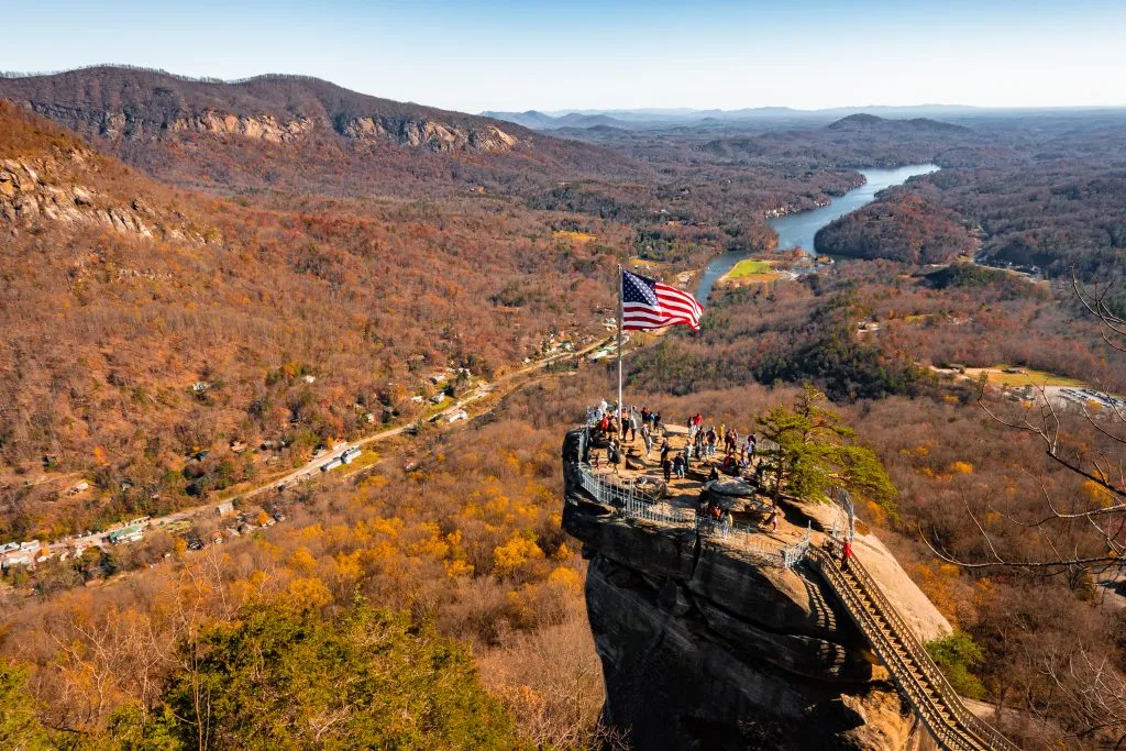 chimney rock near asheville nc with fall foliage, one of the best places to go in november in america