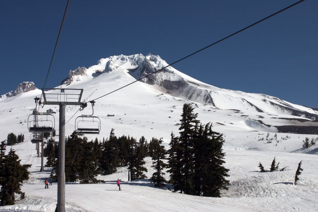 ski lift on a snowy mount hood, one of the best places to go in usa november