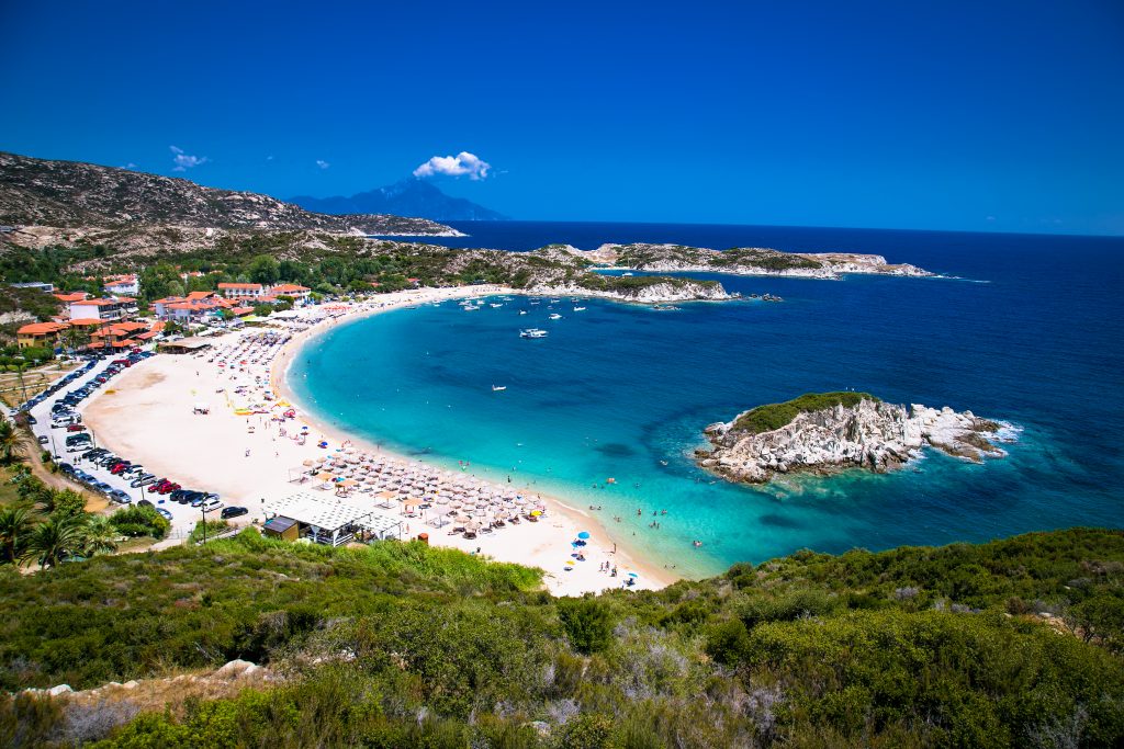 view of busy beach in Halkidiki from above, a fun destination on a greece in 7 days itinerary