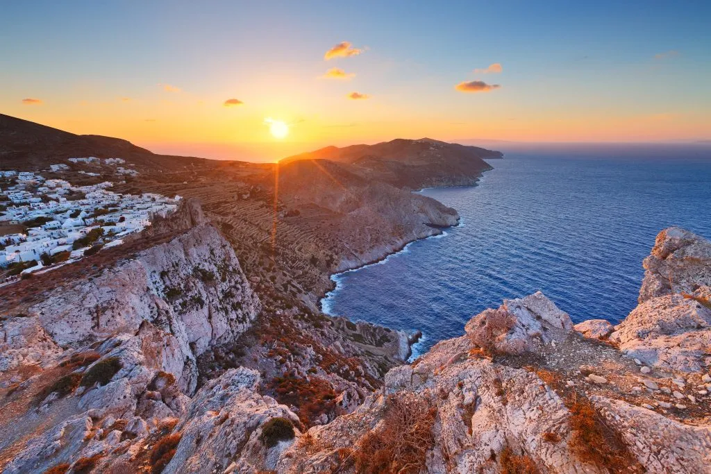 Folegandros village at sunset with the ocean to the right