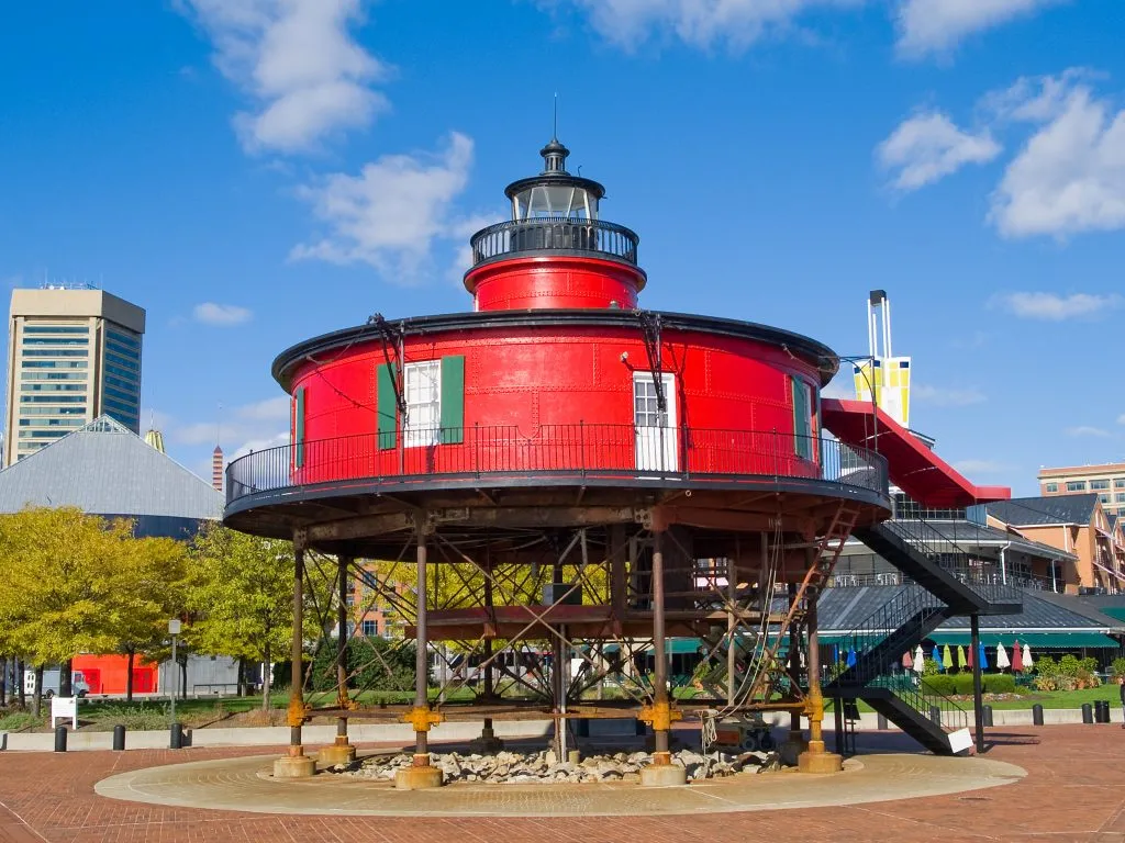 bright red seven foot knoll lighthouse on a sunny day