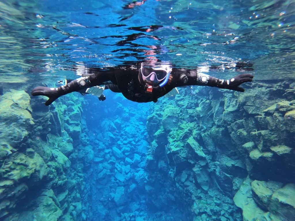 kate storm on silfra snorkeling tour as seen underwater