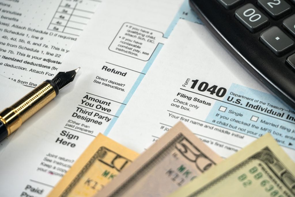 photo of us tax forms, an unavoidable issue if you work while traveling