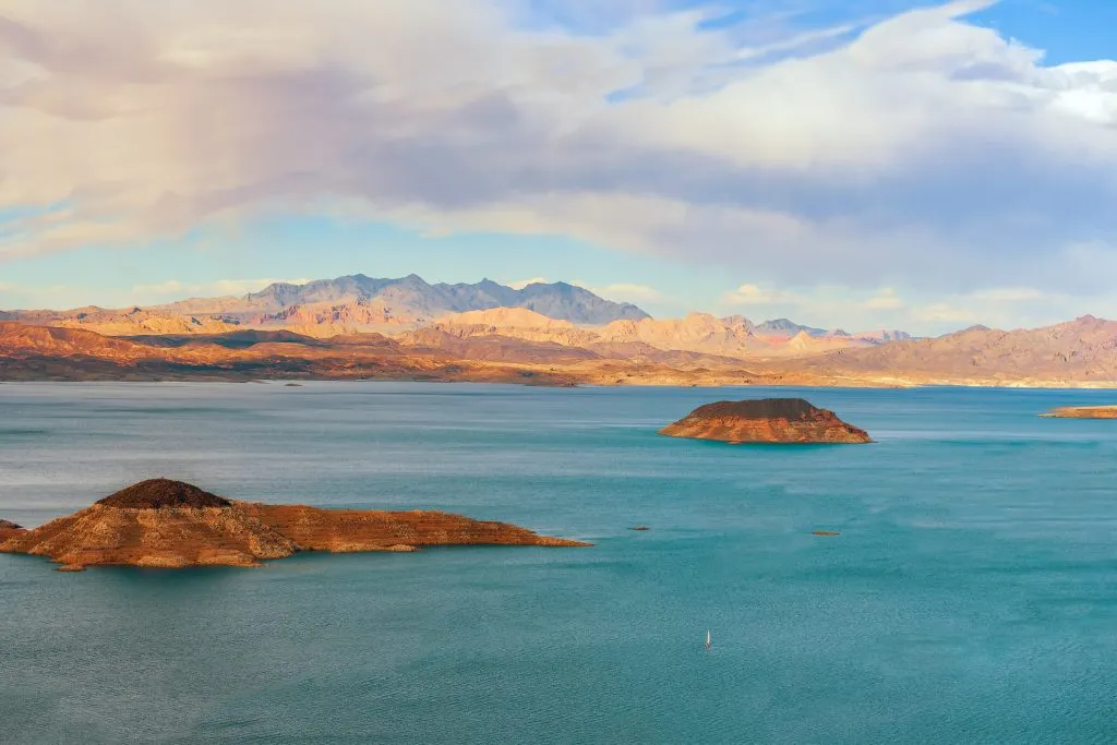 lake mead at sunset with small islands in the distance