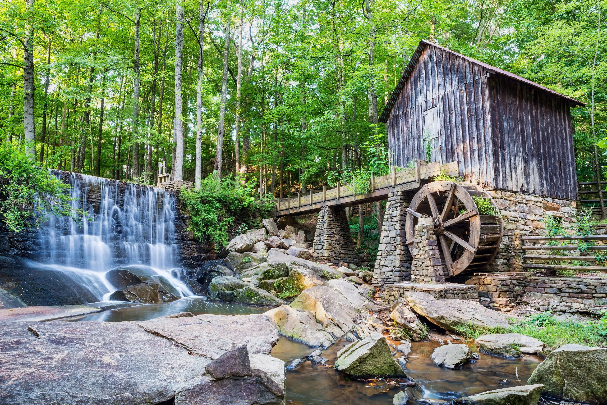 historic mill with a small waterfall, one of the best places to visit in georgia usa