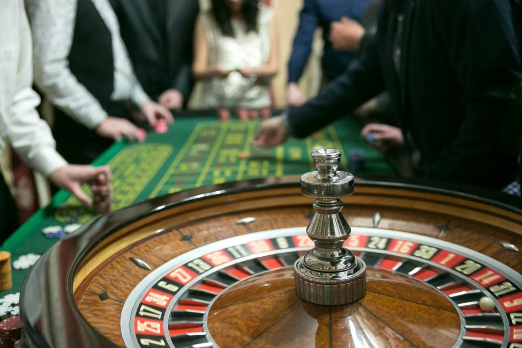 roulette wheel being spun in a casino