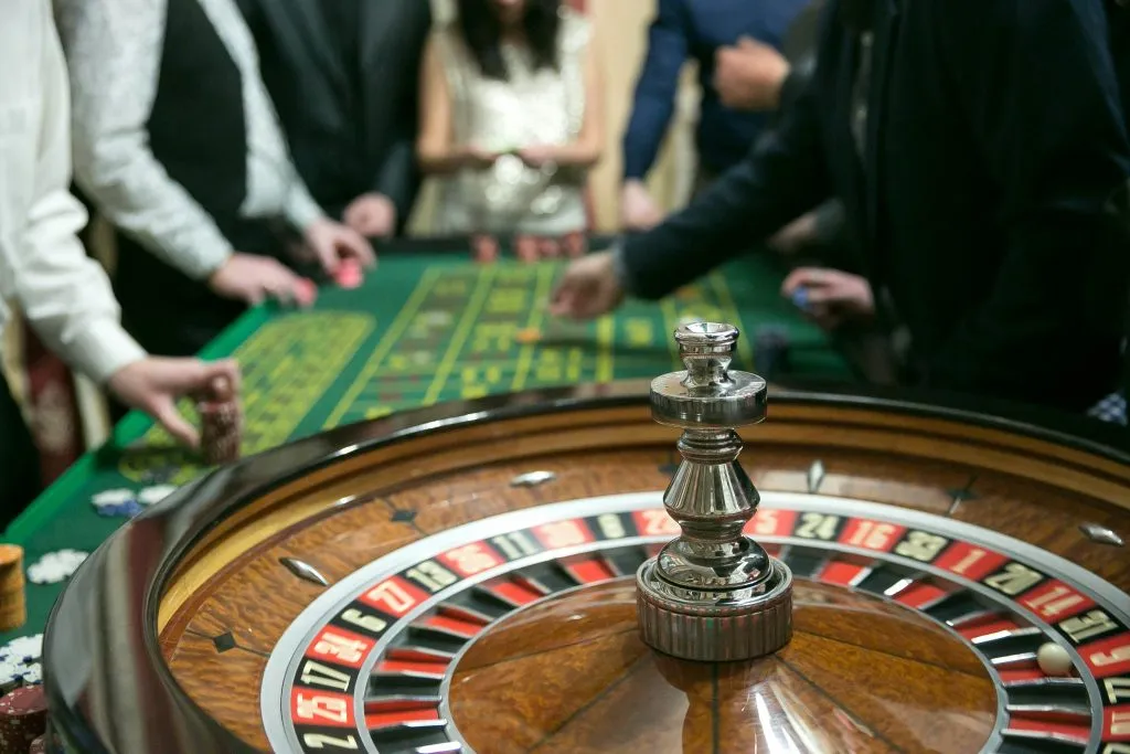 roulette wheel being spun in a casino