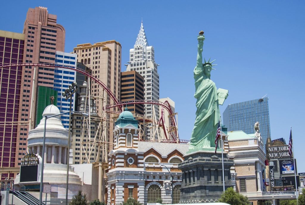view of new york hotel skyline in las vegas with statue of liberty in the foreground