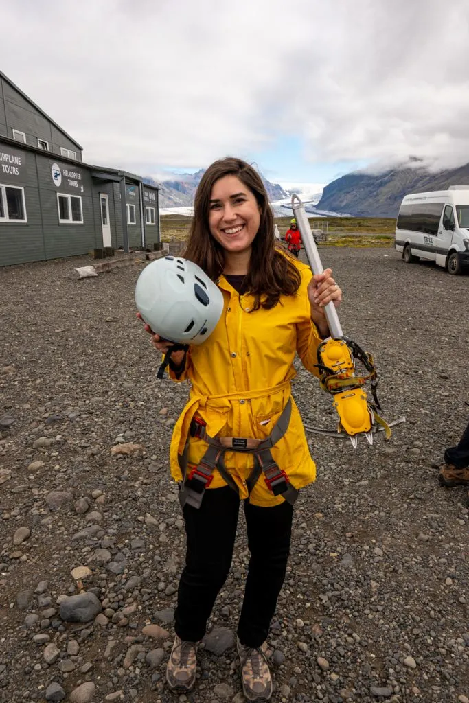 kate storm in a yellow rain jacket with iceland glacier hiking gear