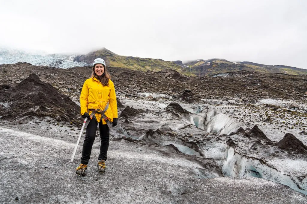 kate storm in a yellow jacket on vatnajokull glacier hike iceland