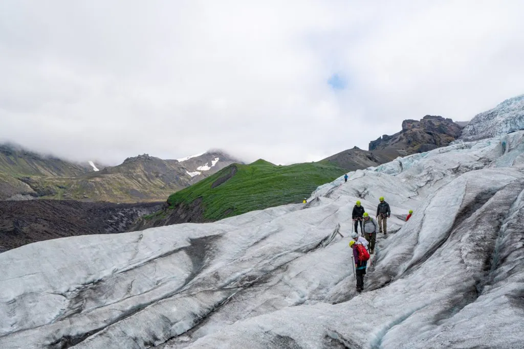 iceland glacier tour group hiking on the ice